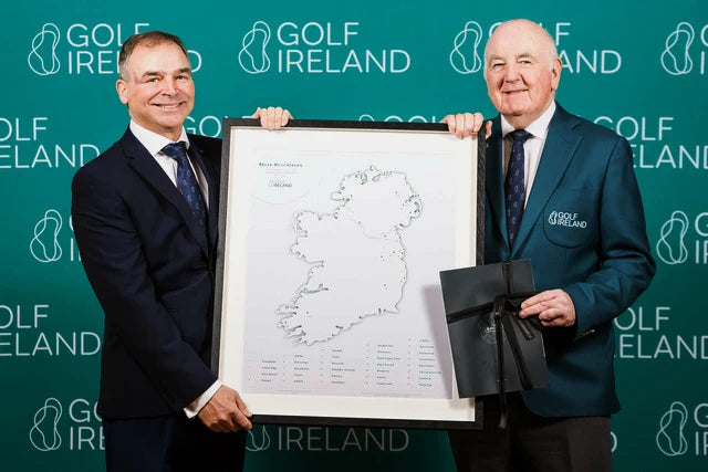 Two officers holding a framed BHÍOS map of Ireland at a Golf Ireland presentation